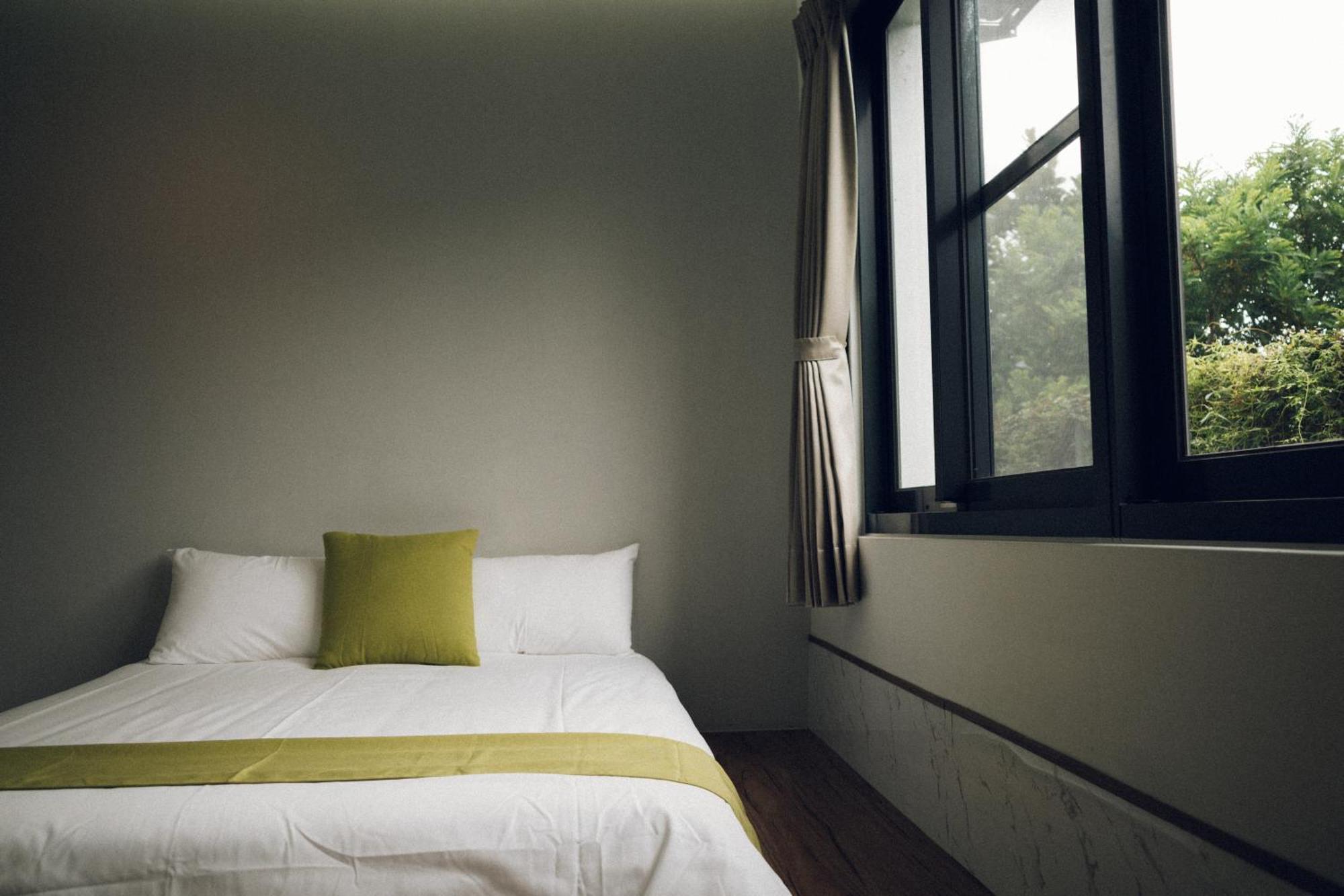 蘊慢築 茶花藝主題民宿 Yun Man Zhu Homestay Gongguan Buitenkant foto